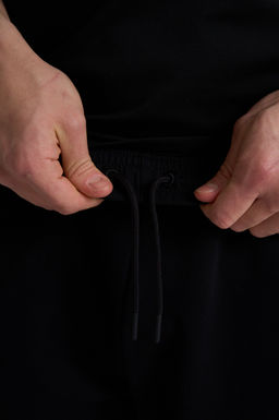 Шорты трикотажные Черный KT Knit Half Pants - Anta фото 10