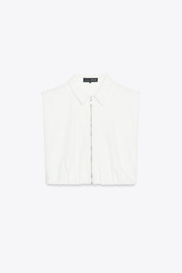 TOPSTITCHED WAISTCOAT WITH ELASTICATED HEM