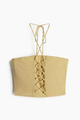 Top halter brillante con lazada