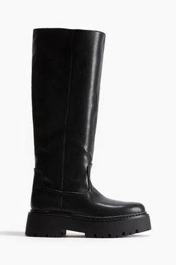 Botas a la rodilla con suela gruesa