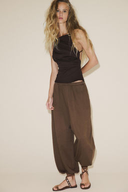 OPEN BACK PLEATED TOP