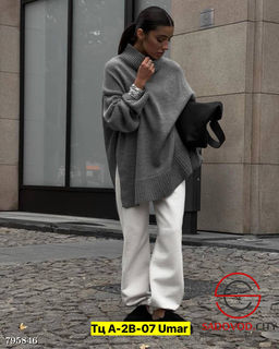 Ультрамодные свитера с разрезами по бокам.