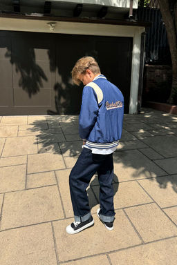 BOMBER JACKET WITH EMBROIDERED SLOGAN