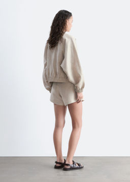 Pantalones cortos plisados en mezcla de lino