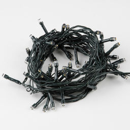 ULD-S0500-050/DGA WARM WHITE IP20 Гирлянда светодиодная, 5м. 50 светодиодов. Теплый белый свет. Провод зеленый. ТМ Uniel