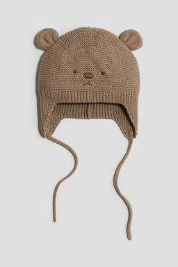 Gorro beanie de punto con tiras de anudar