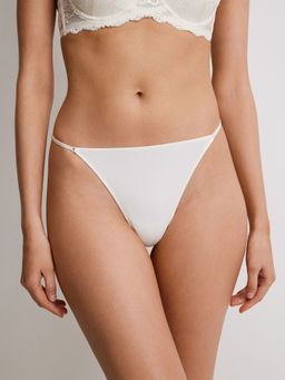 Infinity / Трусы стринги-бразилиано жен. Reva молочный