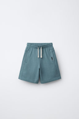 BERMUDA FELPA ETIQUETA / Azul pato