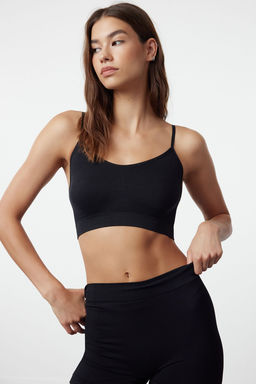 TRENDYOLMILLA Siyah Seamless/Dikissiz Balensiz Ip Ask?l? Orme Bustiyer THMAW21BS0002