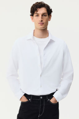 Camisa en tejido el?stico multidirecci?n Slim Fit - H&m фото 5