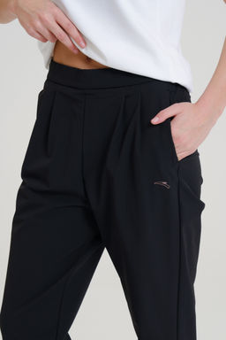 Брюки текстильные Черный TRN Woven Track Pants - Anta фото 3