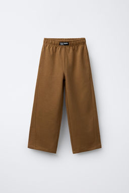 STRAIGHT-LEG PLUSH TROUSERS WITH LABEL