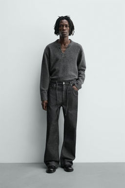 JEANS RELAXED FLARE FIT / Negro