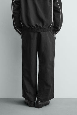 PANTAL?N JOGGER T?CNICO BANDAS CONTRASTE / Negro - Zara фото 3