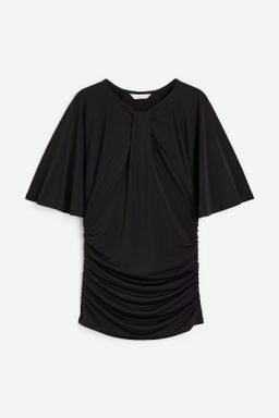 Top con detalle girado