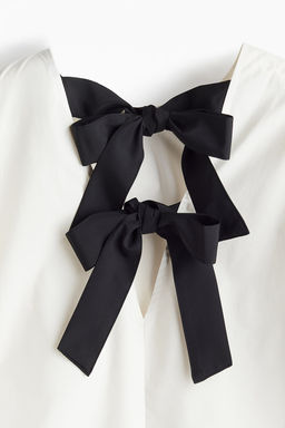 Blusa en mezcla de lyocell con lazada - H&m фото 7