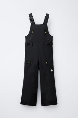 WATER-RESISTANT AND WINDPROOF LONG DUNGAREES RECCO® SYSTEM SKI COLLECTION