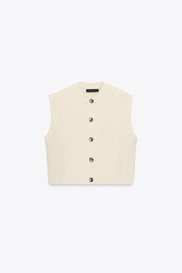 CHALECO PUNTO BOT?N DORADO / Crudo