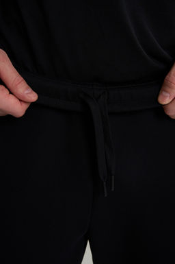 Брюки трикотажные Черный TRN ESSENTIAL Knit Track Pants