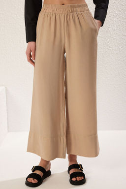 TRENDYOLMILLA Vizon Modal Cep Detayl? Wide Leg/Genis Paca Pileli Dokuma Pantolon TWOSS25PL00081  фото 4