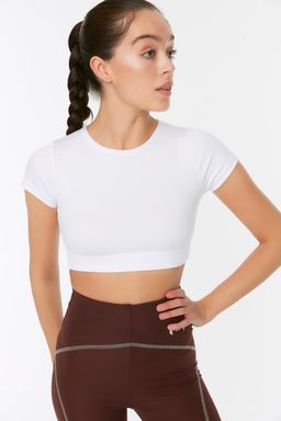 Beyaz Crop Hafif Destekli Yumusak Dokulu Bisiklet Yaka Orme Spor Ust/Bluz TWOAW21BZ0158