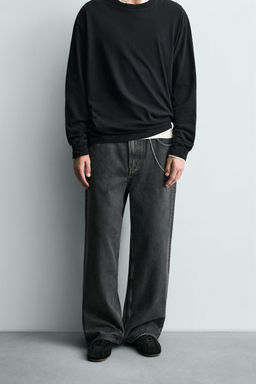 WAXED-EFFECT BAGGY FIT JEANS