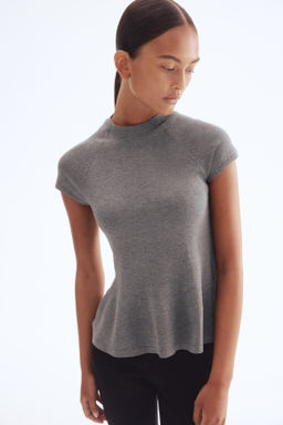 Top en punto fino con peplum - H&m фото 4