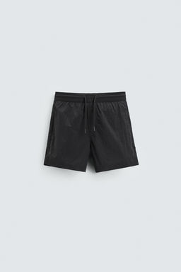 GEOMETRIC PRINT SWIMMING TRUNKS