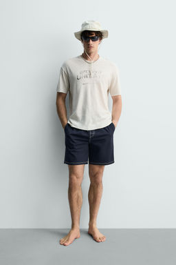 CAMISETA LAVADA ALGOD?N - LINO TEXTO / Blanco