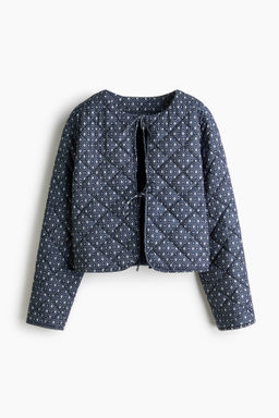 Chaqueta acolchada con cierre de lazadas