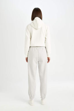 Базовые спортивные штаны для бега из плотной ткани стандартного размера с эластичным поясом и карманами - Defacto фото 6