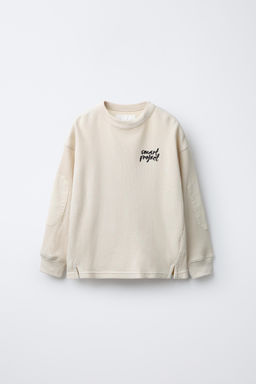 WAFFLE SWEATSHIRT WITH SLOGAN AND ELBOW PATCHES
