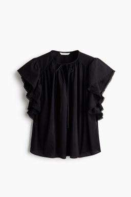 Blusa de manga circular con ribete de encaje