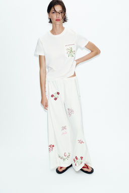 CAMISETA BOLSILLOS BORDADO / Blanco