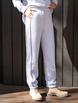 Теплые брюки джоггеры из эластичного футера трехнитки с начесом