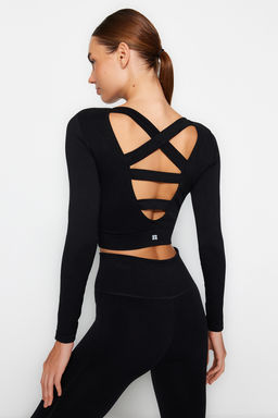 Trendyolmilla Siyah Seamless/Dikissiz S?rt ve Reflektor Bask? Detayl? Crop Orme Spor Ust/Bluz THMAW24BZ00023