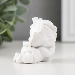 Фигурка полистоун Малыш-ангел в шапочке из цветка, 5?4.5?5 см, МИКС