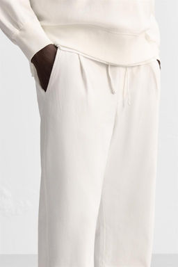 PLEATED JOGGER TROUSERS - Zara фото 12