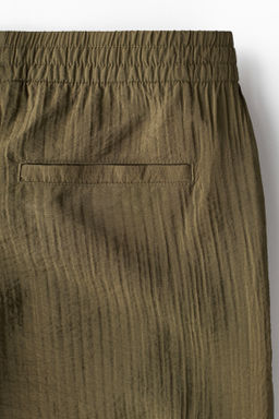 Pantal?n texturizado Relaxed Fit - H&m фото 6