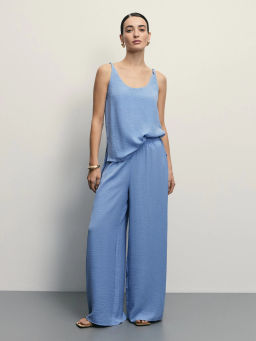 Брюки-палаццо с эластичным поясом из жатой ткани / Zarina