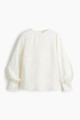 Blusa en tejido jacquard