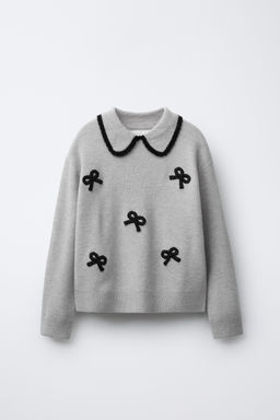 KNIT SWEATER WITH BOWS