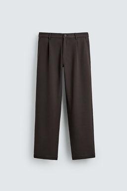 PLEATED TEXTURED TROUSERS