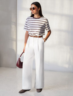 Широкие джинсы с защипами из облегченного денима