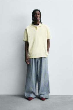 STRIPED OVERSIZE FIT TROUSERS