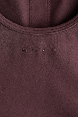 Top de deporte SoftMove con sujetador integrado - H&m фото 9
