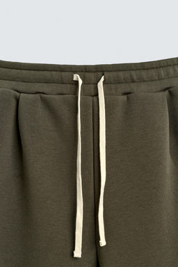 WIDE-LEG NEOPRENE-EFFECT TROUSERS WITH STUDS - Zara фото 9
