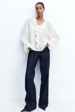 Blusa brillante de plumeti - H&m фото 2