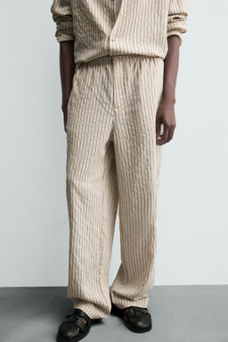 STRIPED WRINKLED-EFFECT FLOWING TROUSERS - Zara фото 5