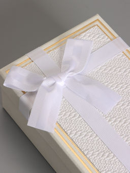 Набор подарочных коробок 3 в 1 прямоугольные с бантом, молочный, 23×16×9.5; 21×14×8; 19×12×6.5 см